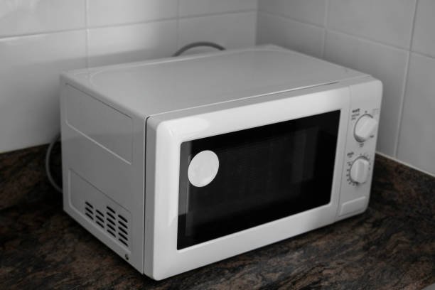 microwave in a kitchen for cooking or heating a dish